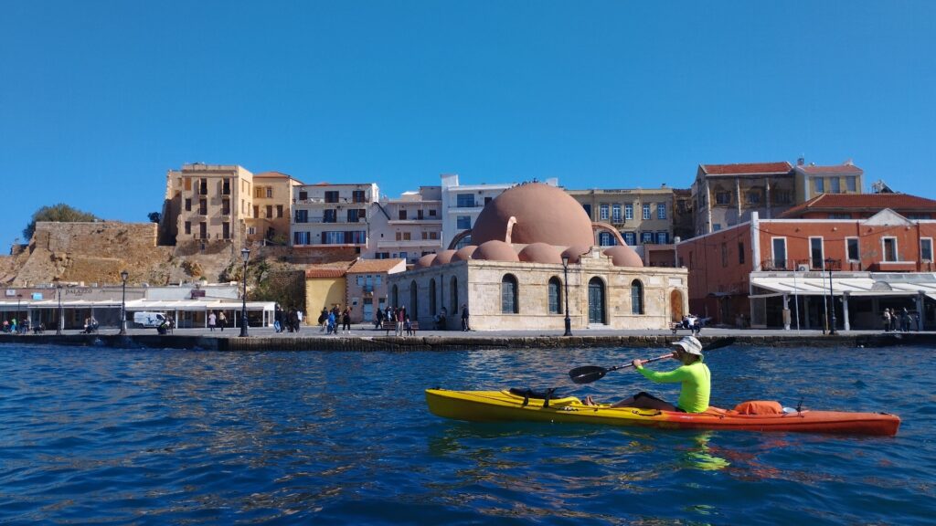 Sea kayaking around the old Venetian port in Chania